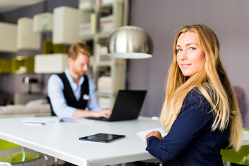 Young business people in the room