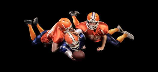 Wall Mural - Young american football players in action with ball isolated