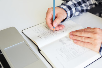 Wall Mural - man sketching graphic design for website