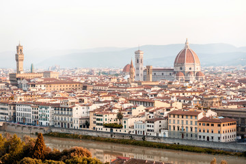 Canvas Print - Florence aerial cityscape view from Michelangelo square on the old town with famous cathedral church and river in the morning in Italy