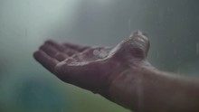 Man Hand In The Rain And Hail