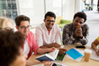 © Syda Productions - group of high school students sitting at table