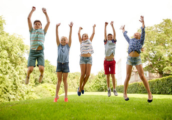 Poster - happy kids jumping and having fun in summer park