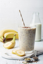 Glass Of Healthy Banana And Seeds Smoothie