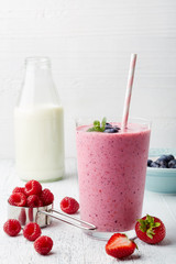 Wall Mural - Glass of fresh berry smoothie