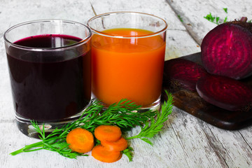 beet and carrot juice in glasses. vitamin drink