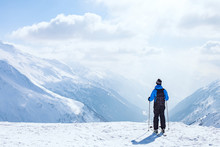 Skiing Background, Skier In Beautiful Mountain Landscape, Winter Holidays In Alps