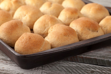 Wall Mural - Fresh homemade whole wheat dinner rolls side view