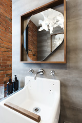 Wall Mural - Close up of vintage style bathroom vanity in renovated warehouse