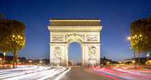 Arc De Triomphe In Paris At Night, France