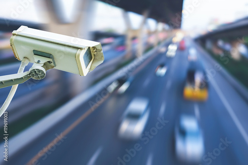 Low Angle Shot On Security Camera With Motion Blur Of Car