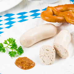 Wall Mural - Bavarian sausage with pretzel, sweet mustard and beer