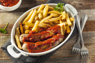 Wall Mural - Homemade Currywurst and French Fries