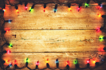 Wall Mural - christmas lights. merry christmas (xmas) background. old wood texture - vintage background