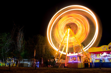 Ferris wheel at an amusement park. Long exposure