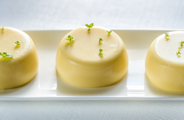 Sticker - Vanilla puddings decorated with fresh mint