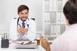 © ImageFlow - Smiling doctor with beard