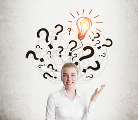 Wall Mural - White shirt girl and light bulb with question marks