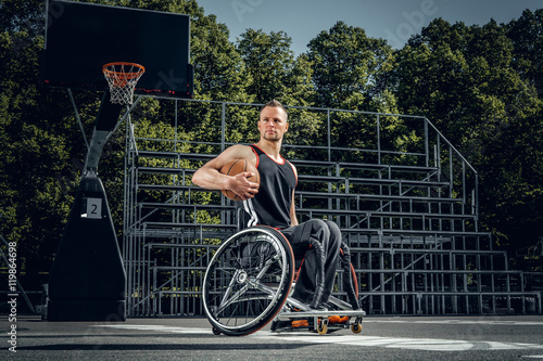 Fotografia, Obraz Portrait of cripple basketball player in wheelchair.