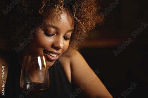 Close Up Shot Of Black Girl With Afro Hairstyle And Healthy Shiny