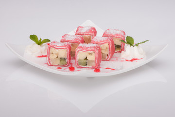 ice cream slices in a dish on a white background