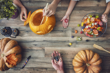 Poster - family preparing for Halloween.