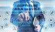 © WrightStudio - Businessman is pressing button on touch screen interface and selecting 'Software as a service'.