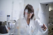 © Westend61 - Young woman working in lab