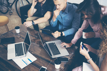 Young Businessman Team Analyze Finance Online Report Modern Electronic Gadgets.Coworkers Startup Digital Project.Creative People Making Great Work Decisions.Tablet Hands Laptop Table.Blurred.