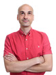 © spaxiax - bald man wearing red shirt looking up