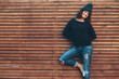 © Alena Ozerova - Hipster girl over wooden wall