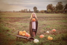Girl With Pumpkin Outdoor