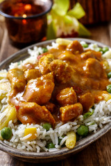 Wall Mural - Chicken curry with basmati rice and green peas