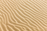 Fototapeta Fototapety z morzem do Twojej sypialni - piasek z falami - tekstury piasku na plaży