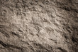 Leinwandbild Motiv Stone background, rock wall backdrop with rough texture. Abstract, grungy and textured surface of stone material. Nature detail of rocks.