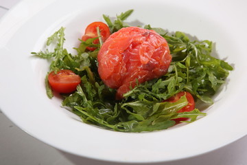 Wall Mural - Red fish on Arugula in white plate