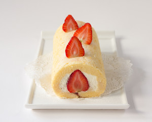 Wall Mural - roll cake topping with strawberry