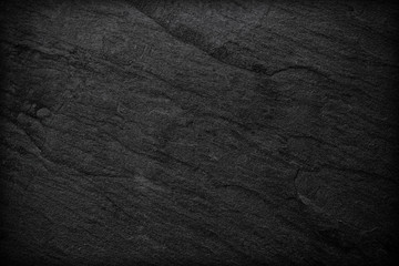 Dark grey black slate background or texture.