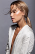 © Serg Zastavkin - Portrait of young beauty woman in casual white jacket
