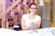 © Sergey Nivens - Young woman architect in office
