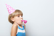 © 5second - Portrait of  little girl in birthday cap on grey background