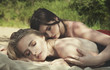 Two girls portrait of a lesbian couple outdoors on a nature