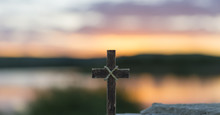 Wooden Christian Cross In The Beautiful Light Of The Sunset