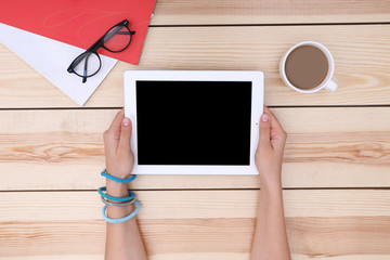 Wall Mural - Woman working with tablet, top view