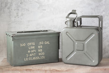 Still Life Photography : Old Army Green Jerrycan ( Fuel Canister ) And Bullet Box ( Ammo Crate ) On Old Wood With Concrete Background