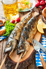 Wall Mural - Grilled mackerel fish with beer and pretzel