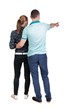 © ghoststone - young couple pointing. Back view.  Rear view people collection.  backside view of person.  Isolated over white background.