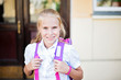© dejah_thoris - happy little schoolgirl portrait near school