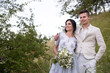 © ronedya - Young couple in love outdoor. Elegant bride and groom posing together outdoors on a wedding day. bride and groom in the Park. young couple in the woods. young couple in the grass. couple walking