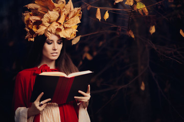 Woman With Autumn Leaves Crown Reading a Book